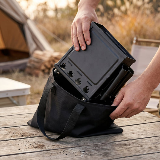Réchaud de camping à bois Rovnak plié dans son sac de transport