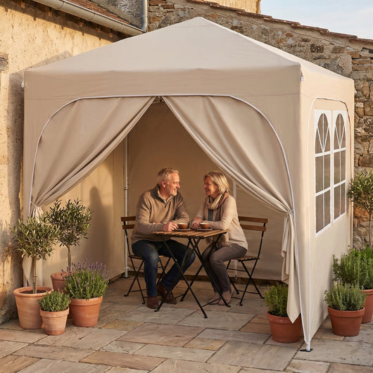 Tonnelle pliante 2x2 m Velmara sur une terrasse en pierre